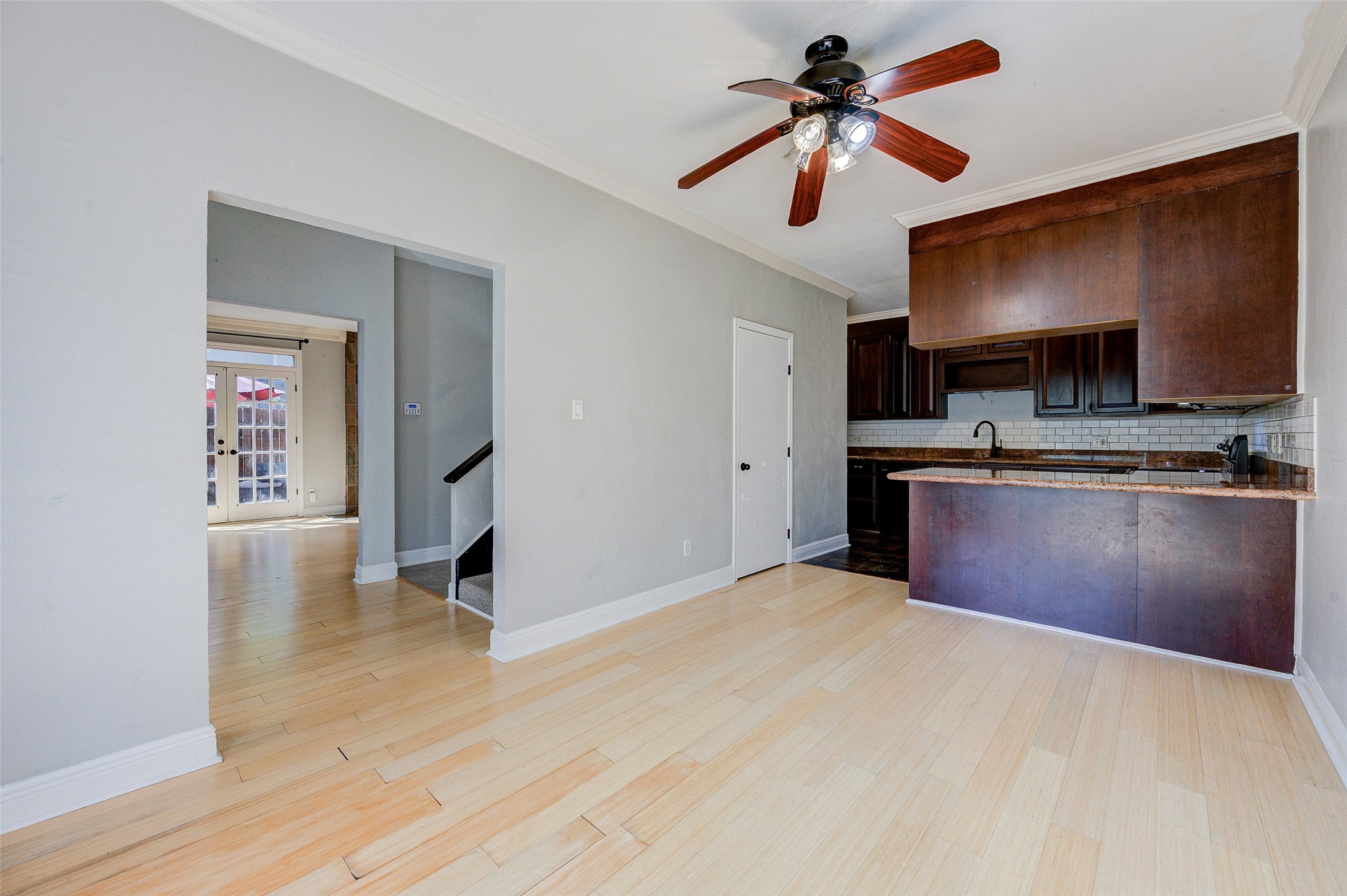 2100 Tanglewilde Street, Unit 51 Houston, TX 77063 - Photo 8 of 24 a kitchen with stainless steel appliances granite countertop a sink a stove and refrigerator