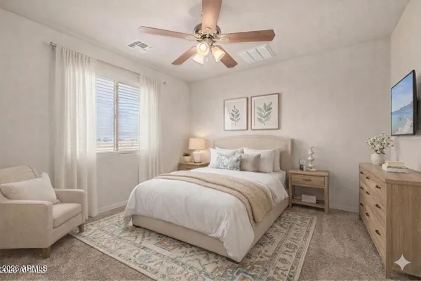 a bedroom with a bed and furniture with window