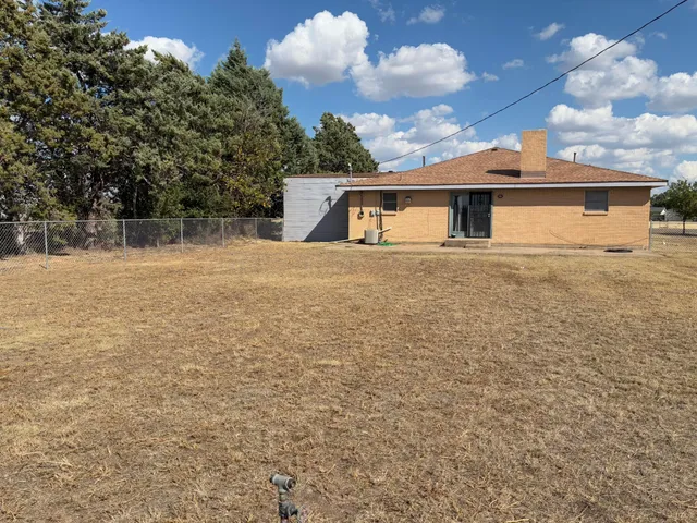a front view of house with yard