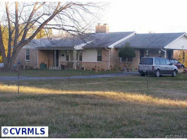 1261 Stoney Point Road Farmville, VA 23901 - Photo 1 of 6 a view of pool with tree in front of it