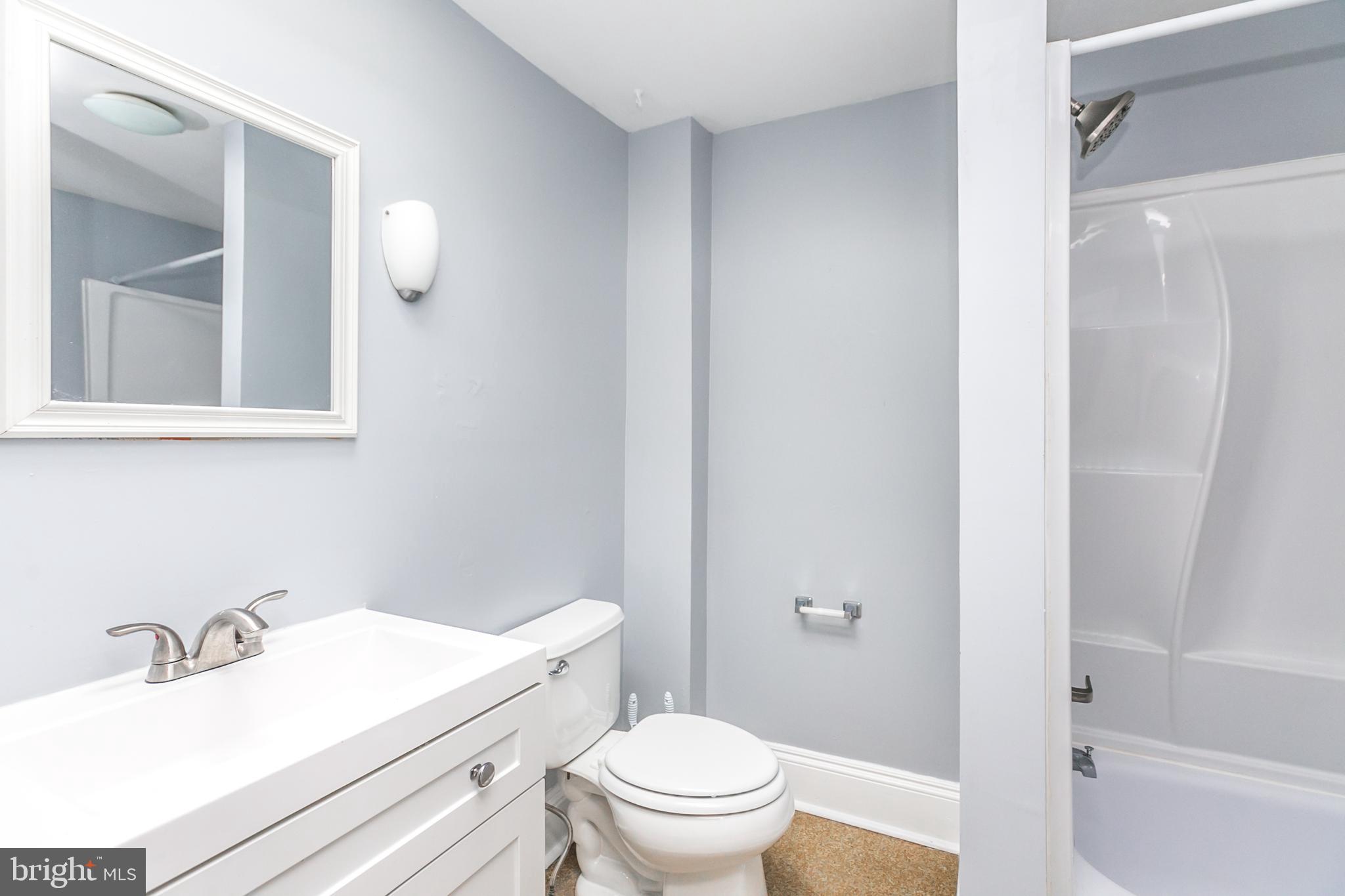 3535 Old York Road Baltimore, MD 21218 - Photo 23 of 33 Updated full bathroom with tub and skylight