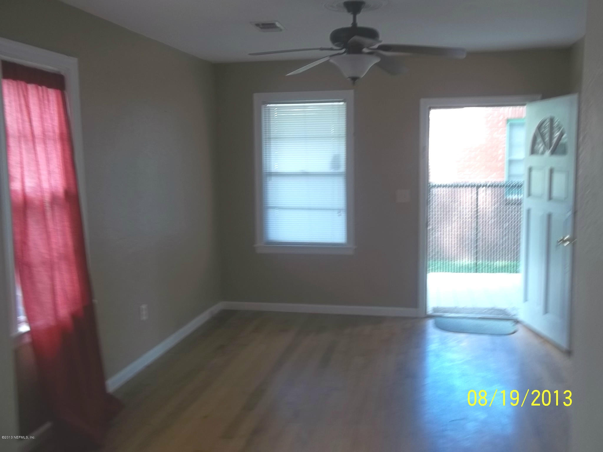 5039 Sunderland Road Jacksonville, FL 32210 - Photo 6 of 20 en empty room with windows