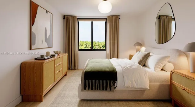 a living room with furniture and a floor to ceiling window