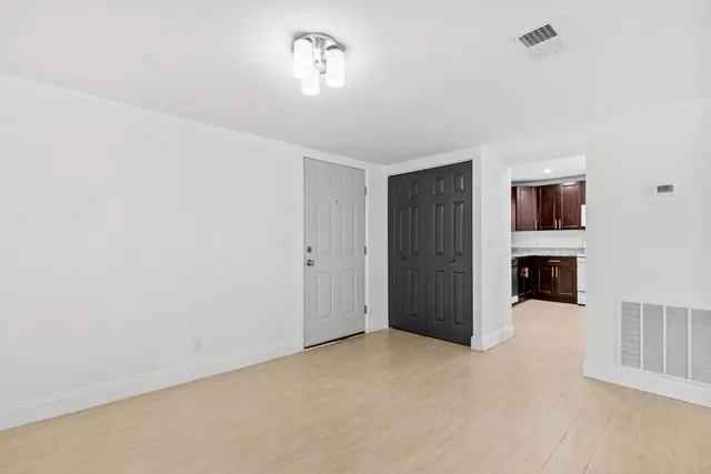 an empty room with windows