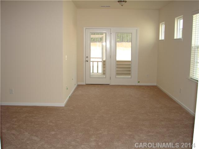 4113 Perth Road, Unit 375 Indian Land, SC 29707 - Photo 4 of 9 an empty room with windows
