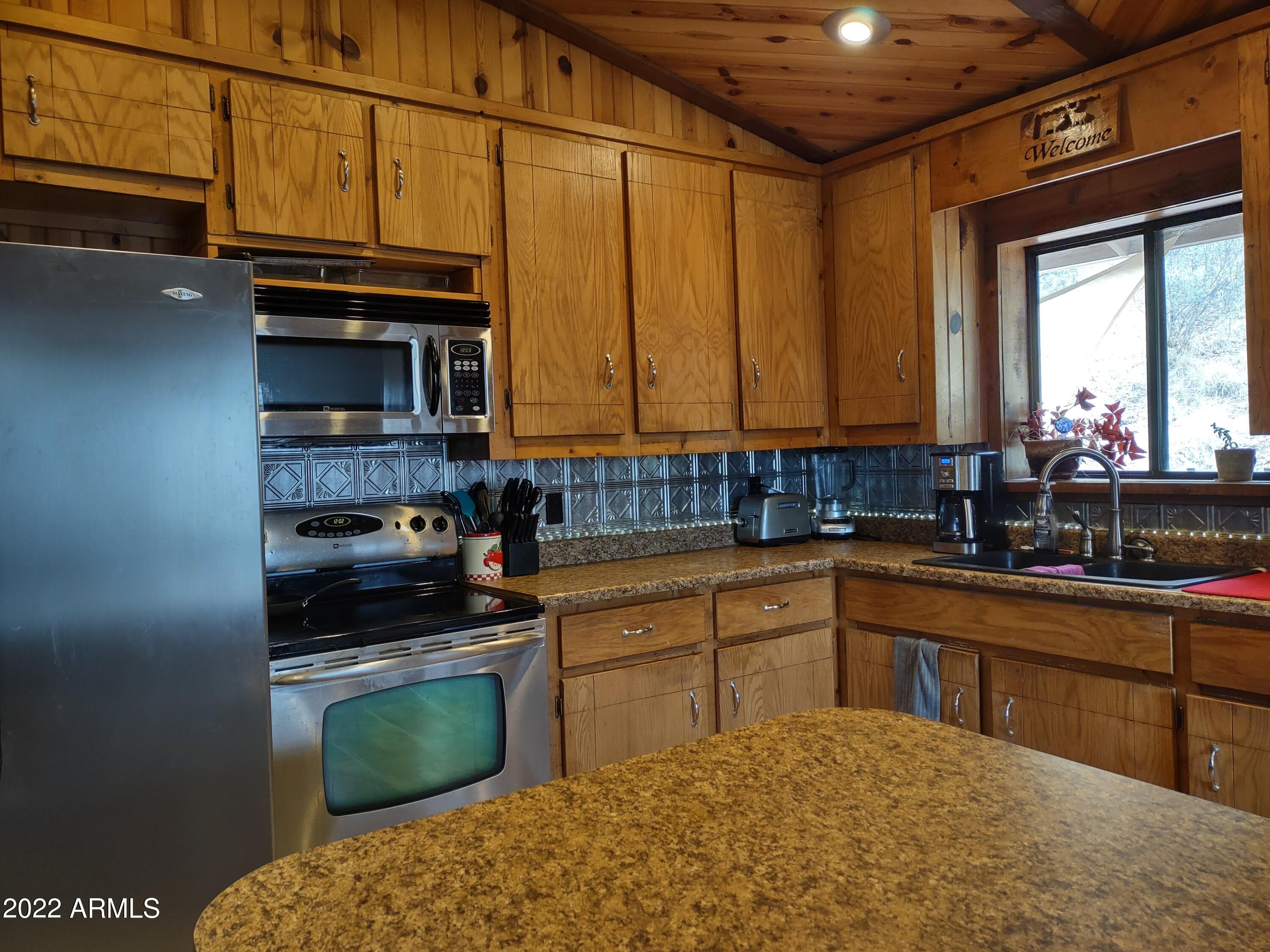 1313 West Rim Drive Payson, AZ 85541 - Photo 9 of 53 KITCHEN WITH ISLAND