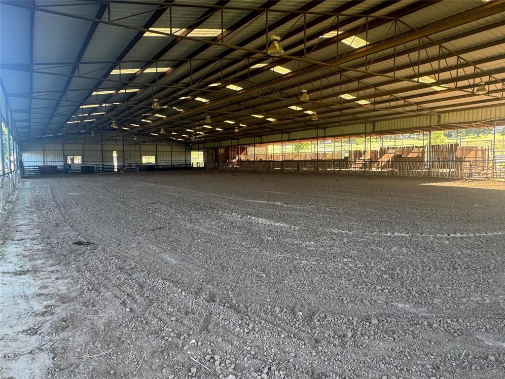 377 Private Road 3249, Unit ARENA Decatur, TX 76234 - Photo 13 of 40 a view of a room with an empty space