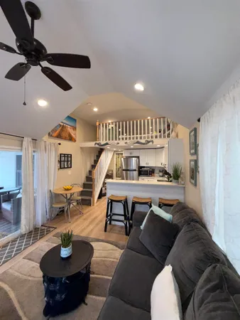 a bedroom with furniture and a couch