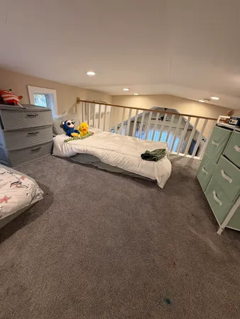 a view of balcony with furniture