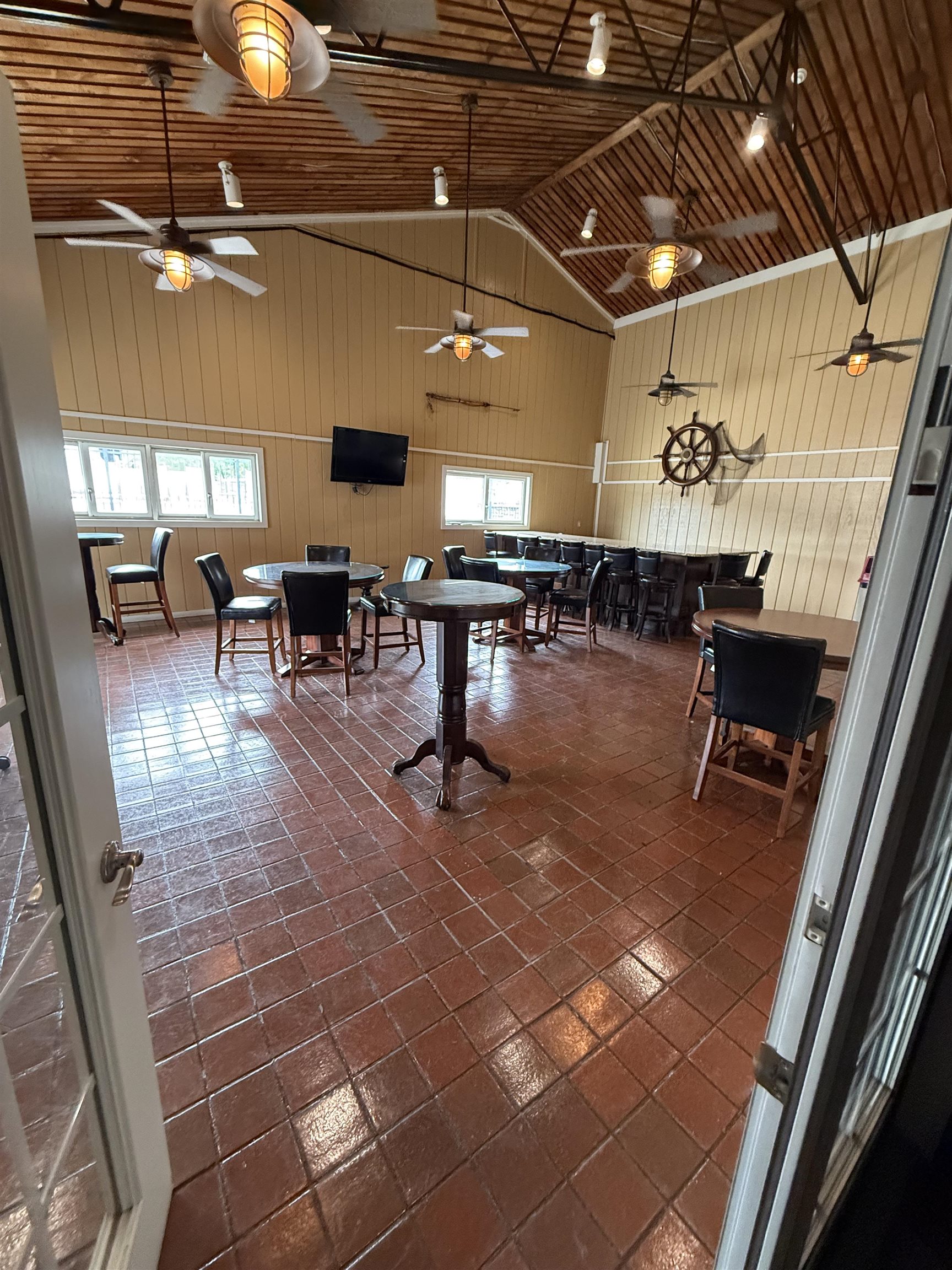 515 Corsons Tavern Road Ocean View, NJ 08230 - Photo 20 of 23 a gym room with lots of tables and chairs