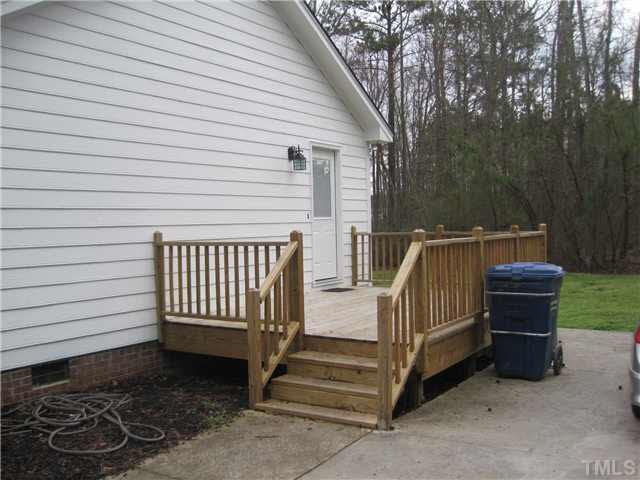 405 Wilson Jones Road Clayton, NC 27520 - Photo 15 of 16 Grill and enjoy friends on this convenient deck & concrete pad.