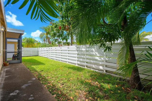 a view of outdoor space and yard