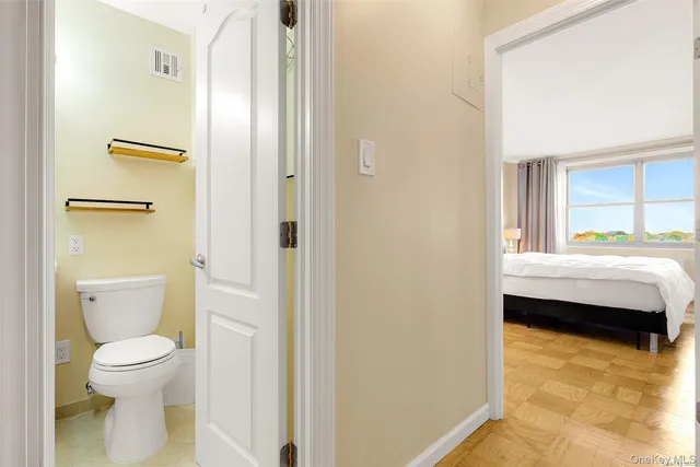 a bathroom with a toilet sink and tub