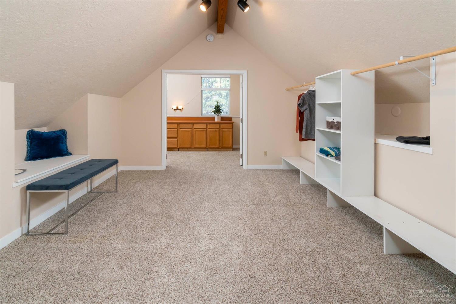 60098 Cinder Butte Road Bend, OR 97702 - Photo 14 of 25 a living room with furniture and a flat screen tv