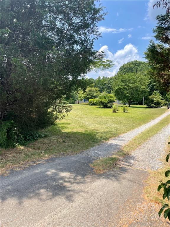 1255 Colonial Road Clover, SC 29710 - Photo 14 of 20 a view of a yard with a large trees