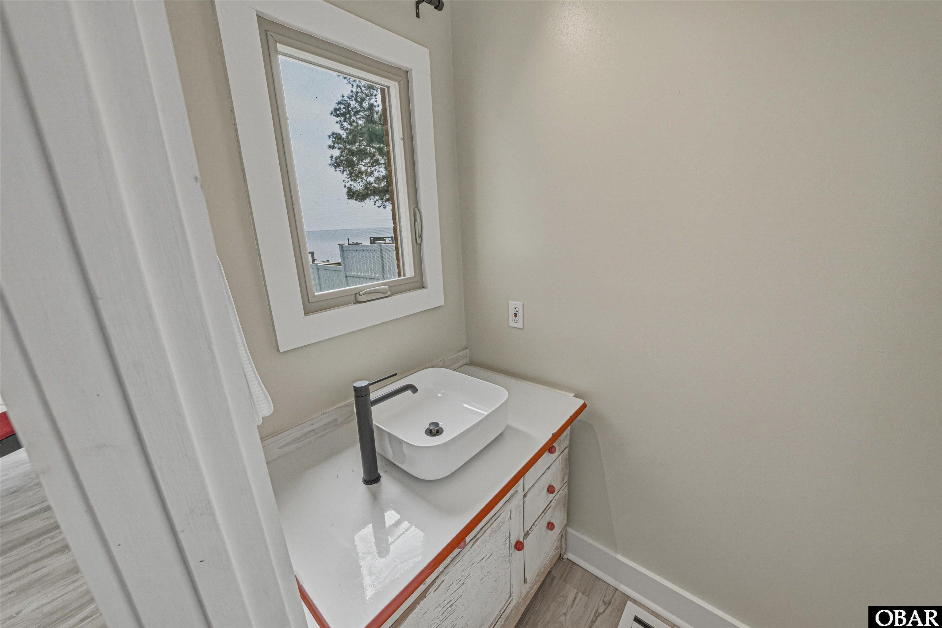 932 Waterlily Road Coinjock, NC 27923 - Photo 8 of 86 First Floor Half Bath
