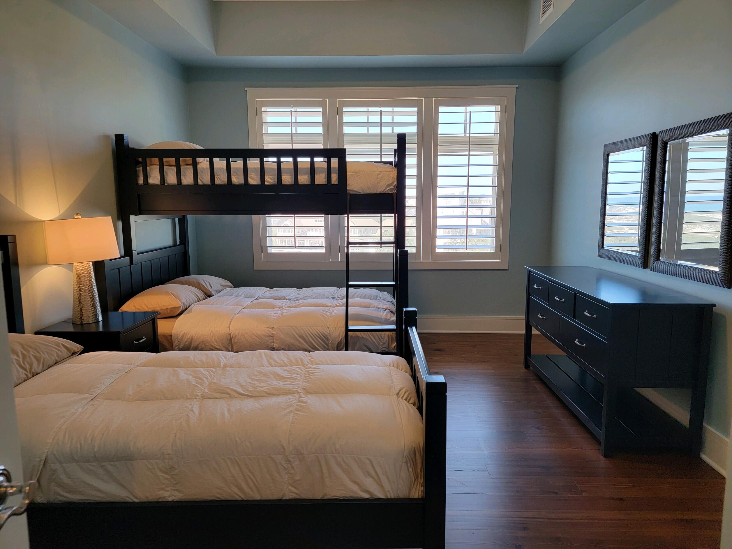 99 Compass Point Way South, Unit 402 Inlet Beach, FL 32461 - Photo 11 of 36 a bedroom with double bed and a window