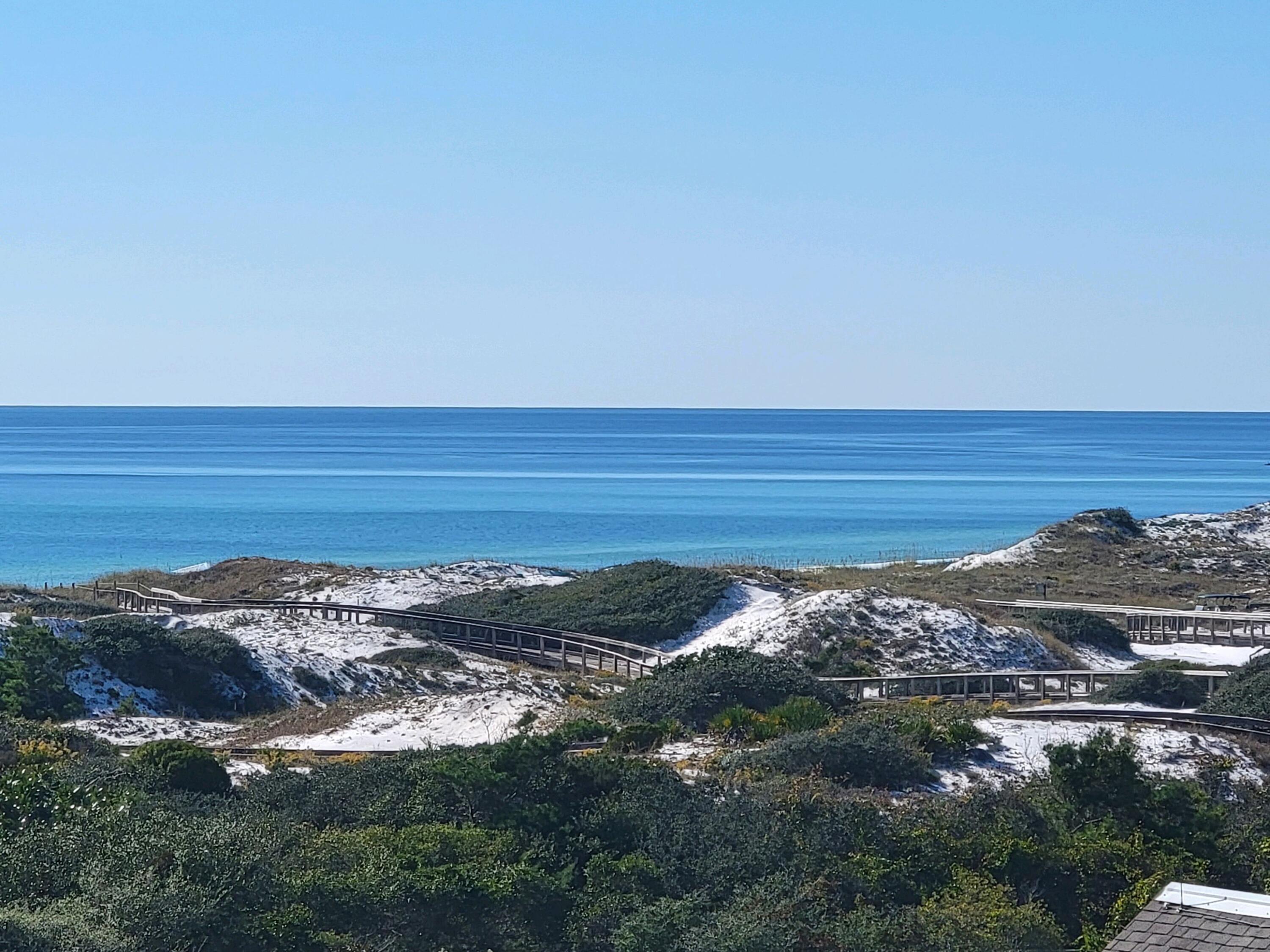 99 Compass Point Way South, Unit 402 Inlet Beach, FL 32461 - Photo 2 of 36 a view of an ocean beach