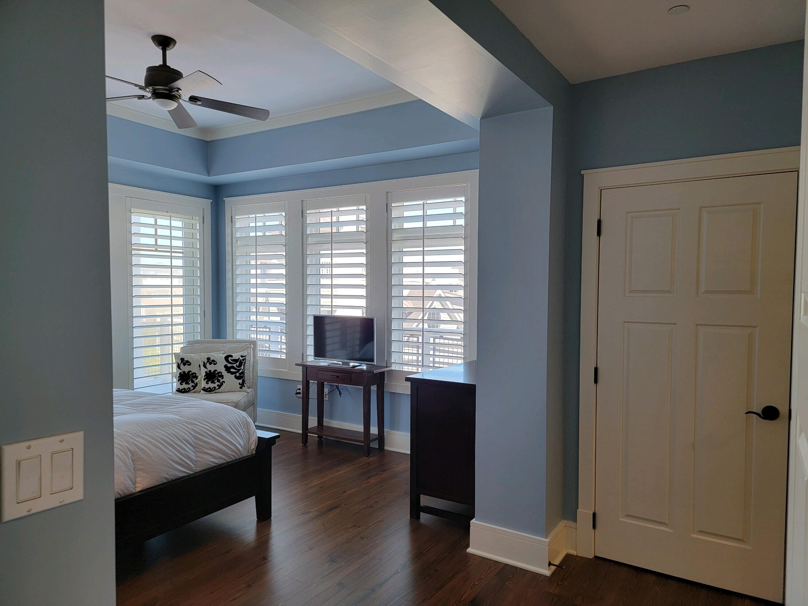 99 Compass Point Way South, Unit 402 Inlet Beach, FL 32461 - Photo 21 of 36 a bedroom with furniture and windows