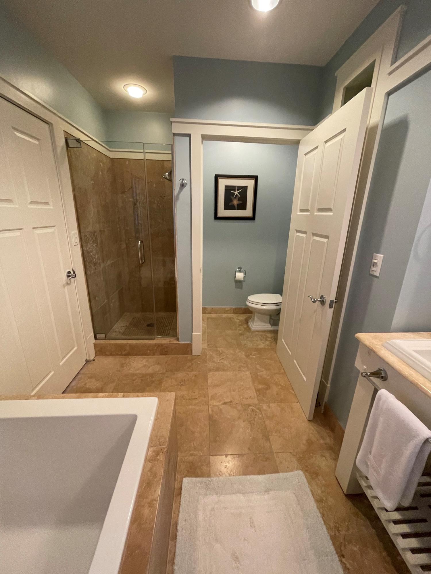 99 Compass Point Way South, Unit 402 Inlet Beach, FL 32461 - Photo 26 of 36 a bathroom with a tub shower and a sink