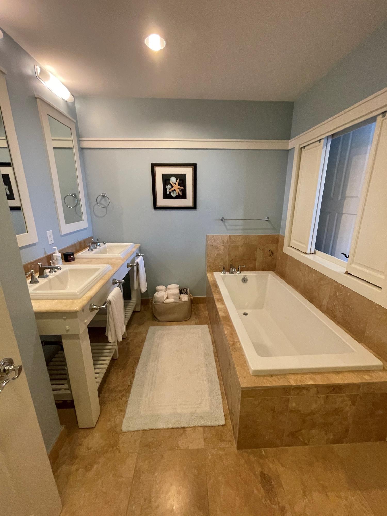 99 Compass Point Way South, Unit 402 Inlet Beach, FL 32461 - Photo 27 of 36 a bathroom with a sink and a mirror