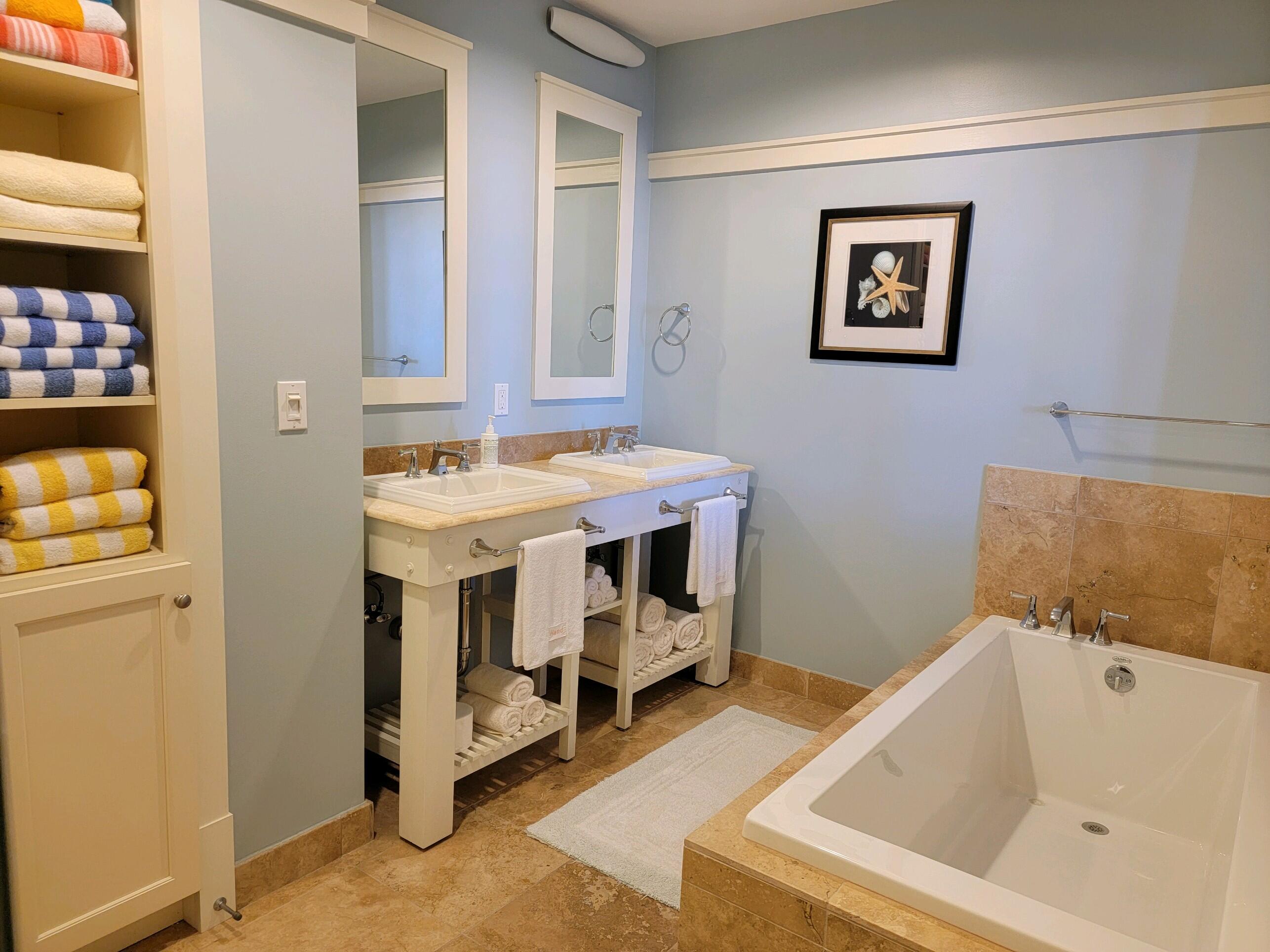 99 Compass Point Way South, Unit 402 Inlet Beach, FL 32461 - Photo 28 of 36 a bathroom with a sink and a bathtub