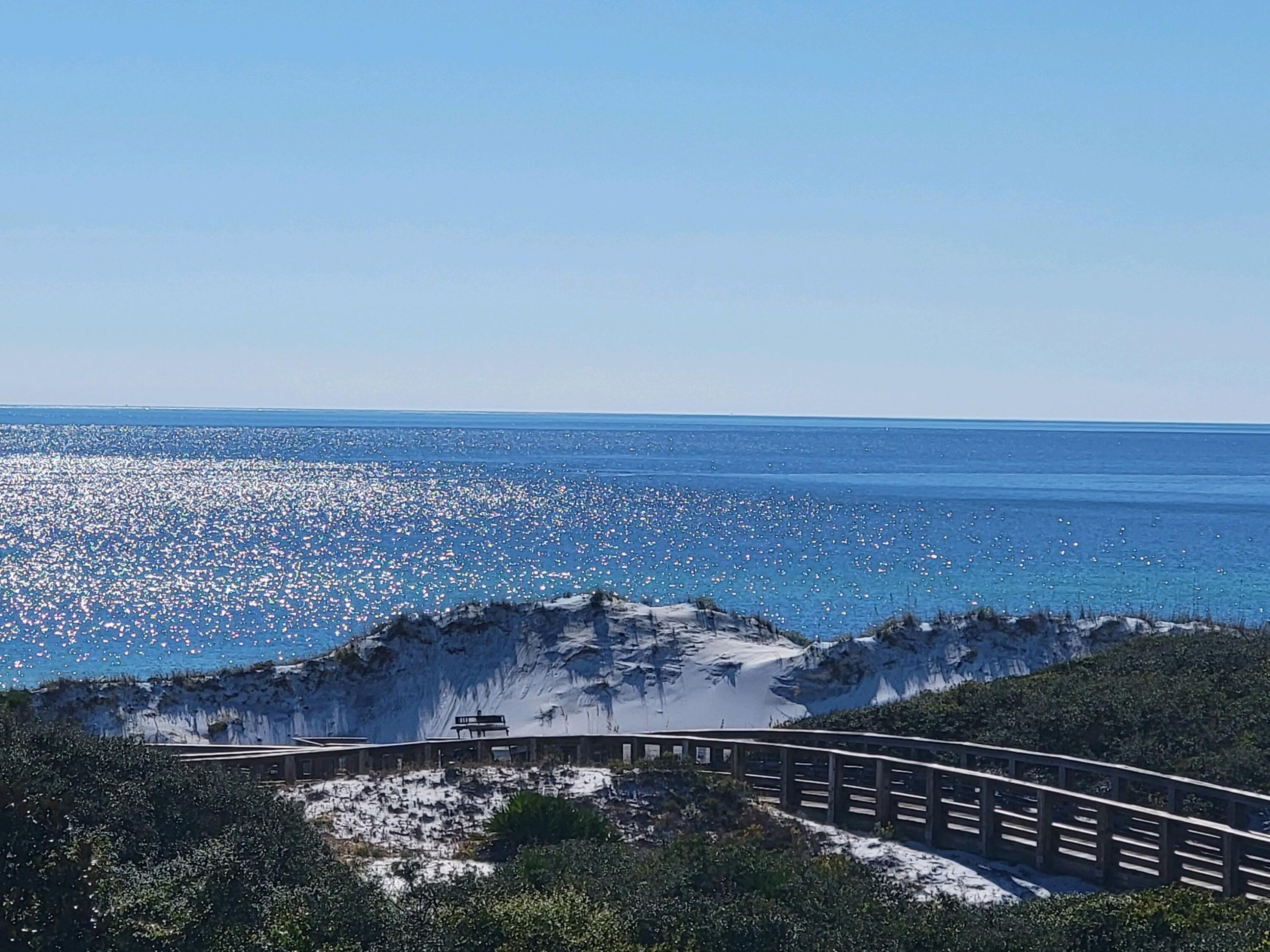99 Compass Point Way South, Unit 402 Inlet Beach, FL 32461 - Photo 3 of 36 a view of an ocean & building
