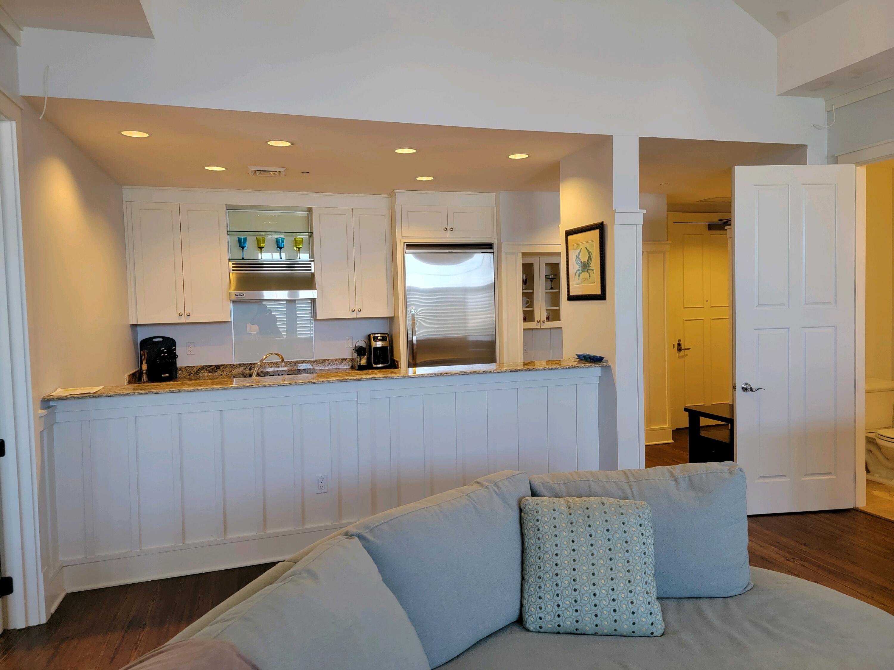99 Compass Point Way South, Unit 402 Inlet Beach, FL 32461 - Photo 33 of 36 a living room with furniture and wooden floor