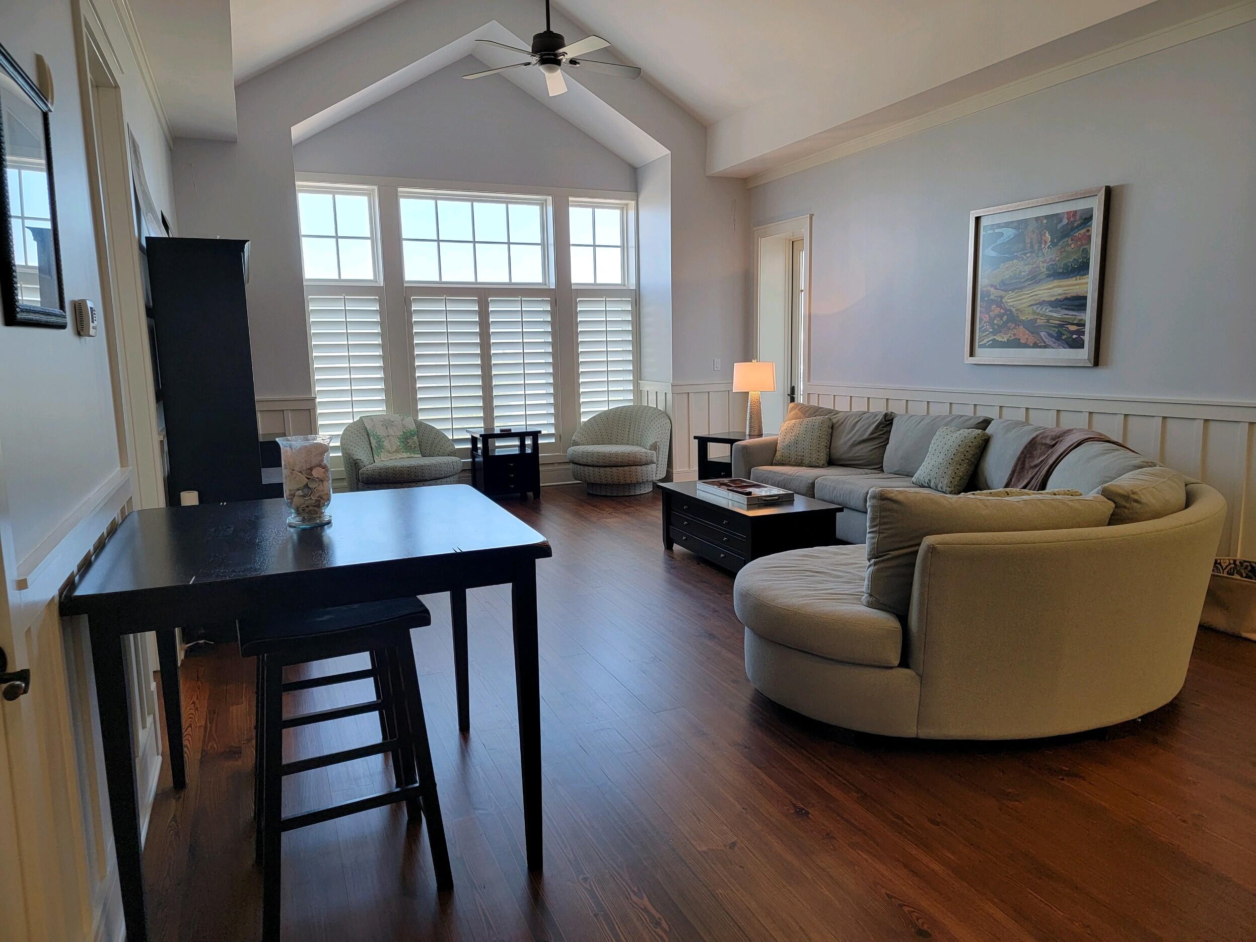 99 Compass Point Way South, Unit 402 Inlet Beach, FL 32461 - Photo 36 of 36 a living room with furniture and a window