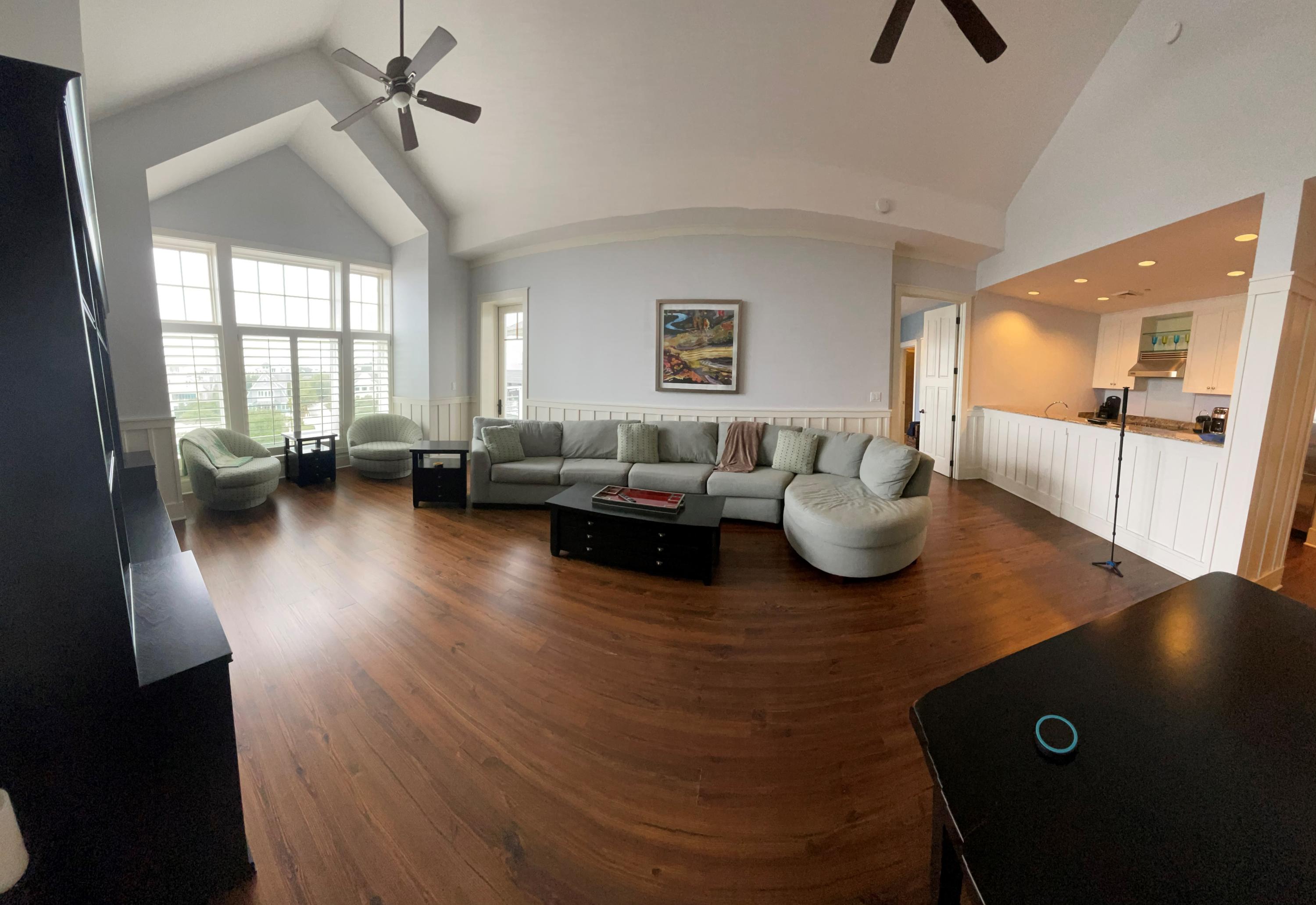 99 Compass Point Way South, Unit 402 Inlet Beach, FL 32461 - Photo 10 of 36 a living room with furniture and a large window