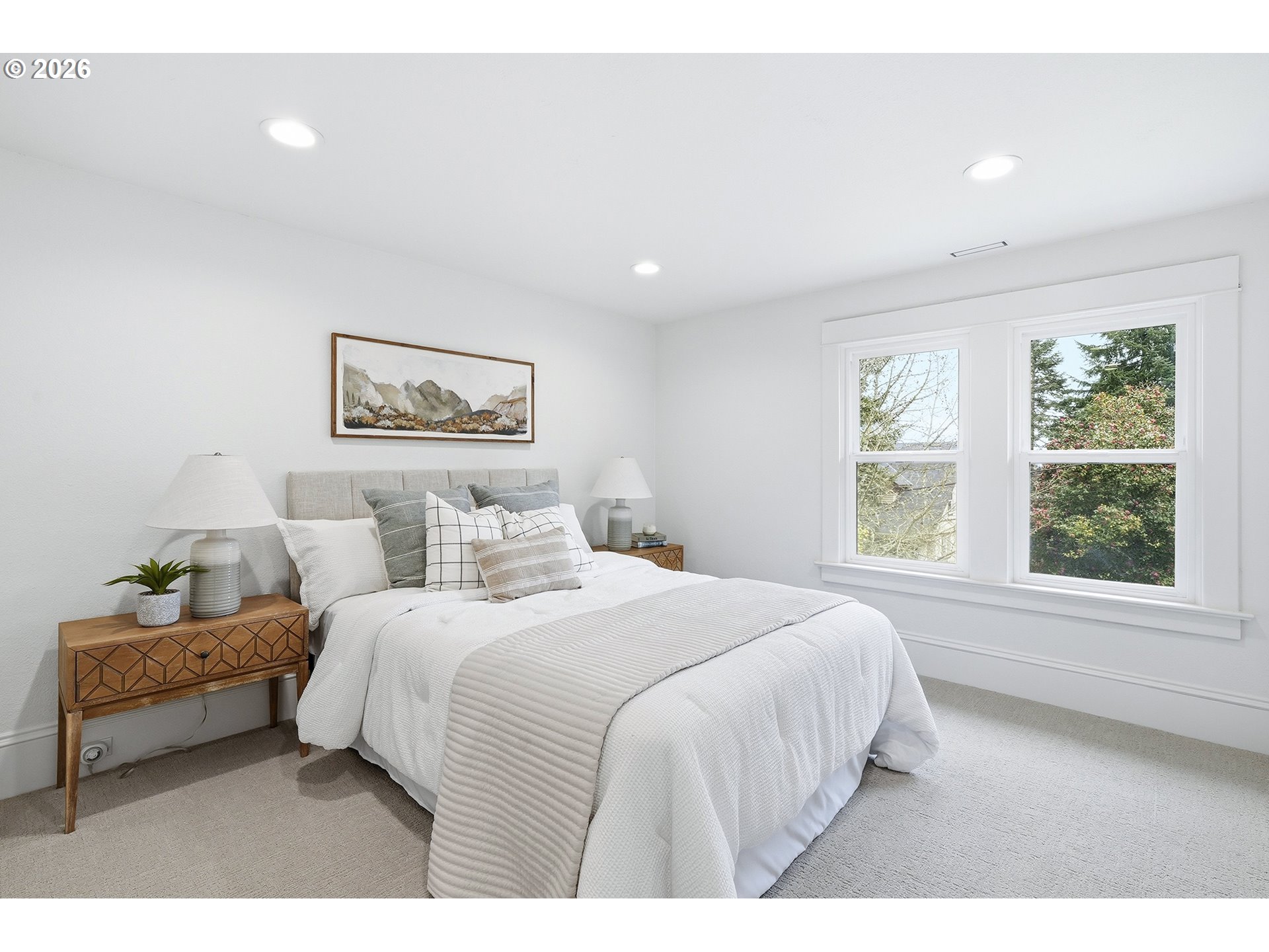 2125 Northwest 33rd Avenue Portland, OR 97210 - Photo 20 of 46 a bedroom with a bed and a painting on the wall