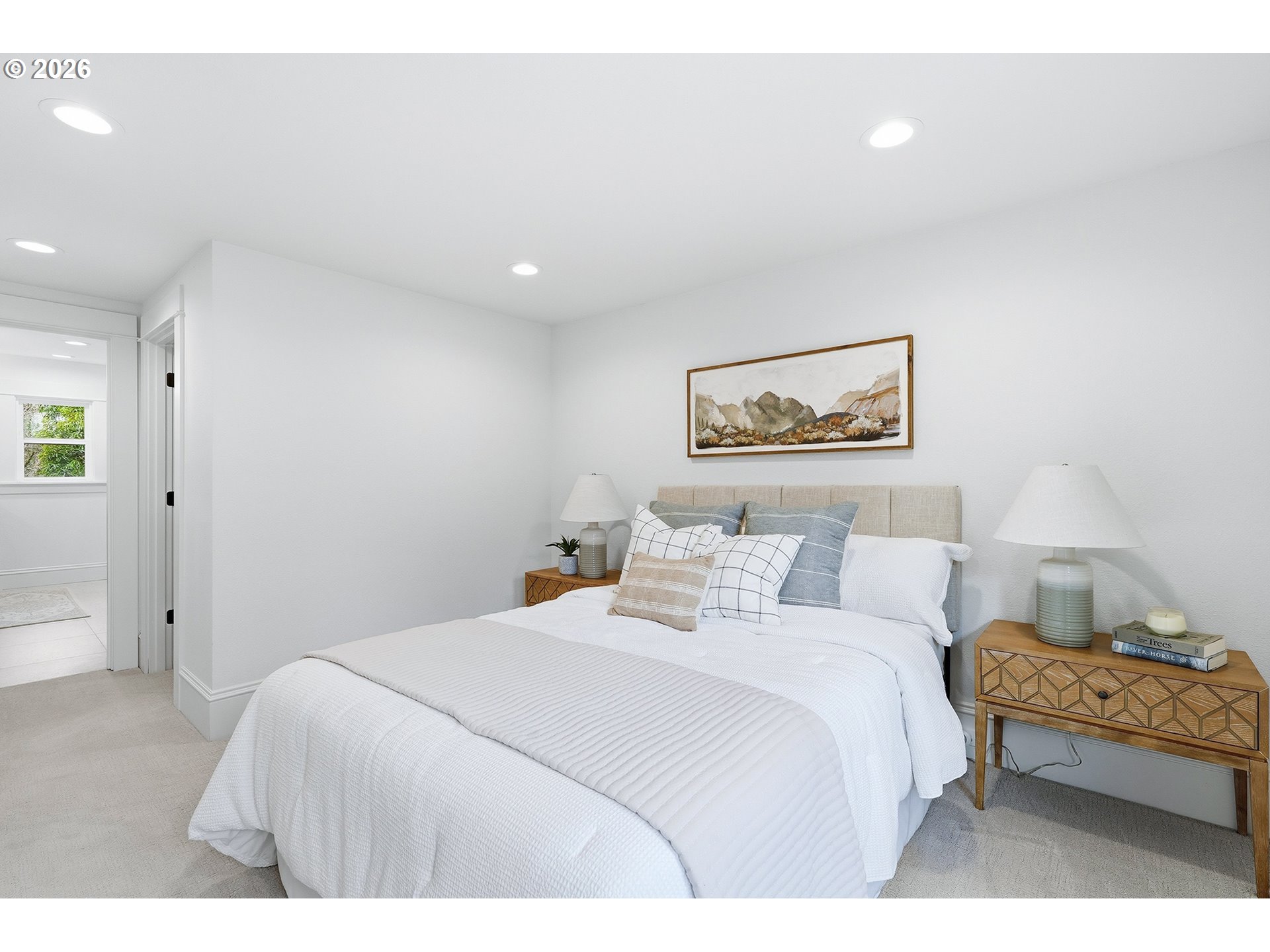 2125 Northwest 33rd Avenue Portland, OR 97210 - Photo 21 of 46 a bedroom with a bed and a painting on the wall
