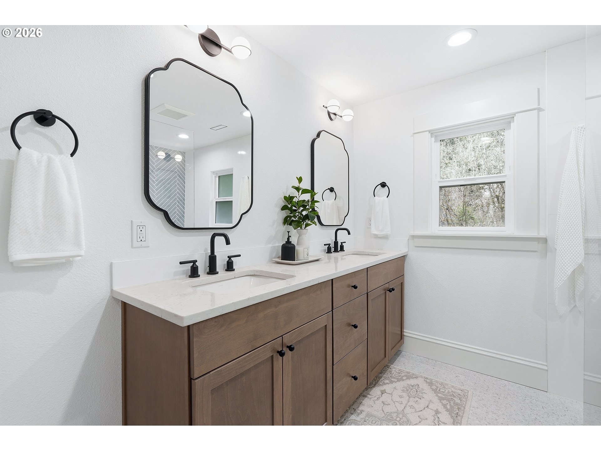 2125 Northwest 33rd Avenue Portland, OR 97210 - Photo 23 of 46 a bathroom with 2 sink and a mirror