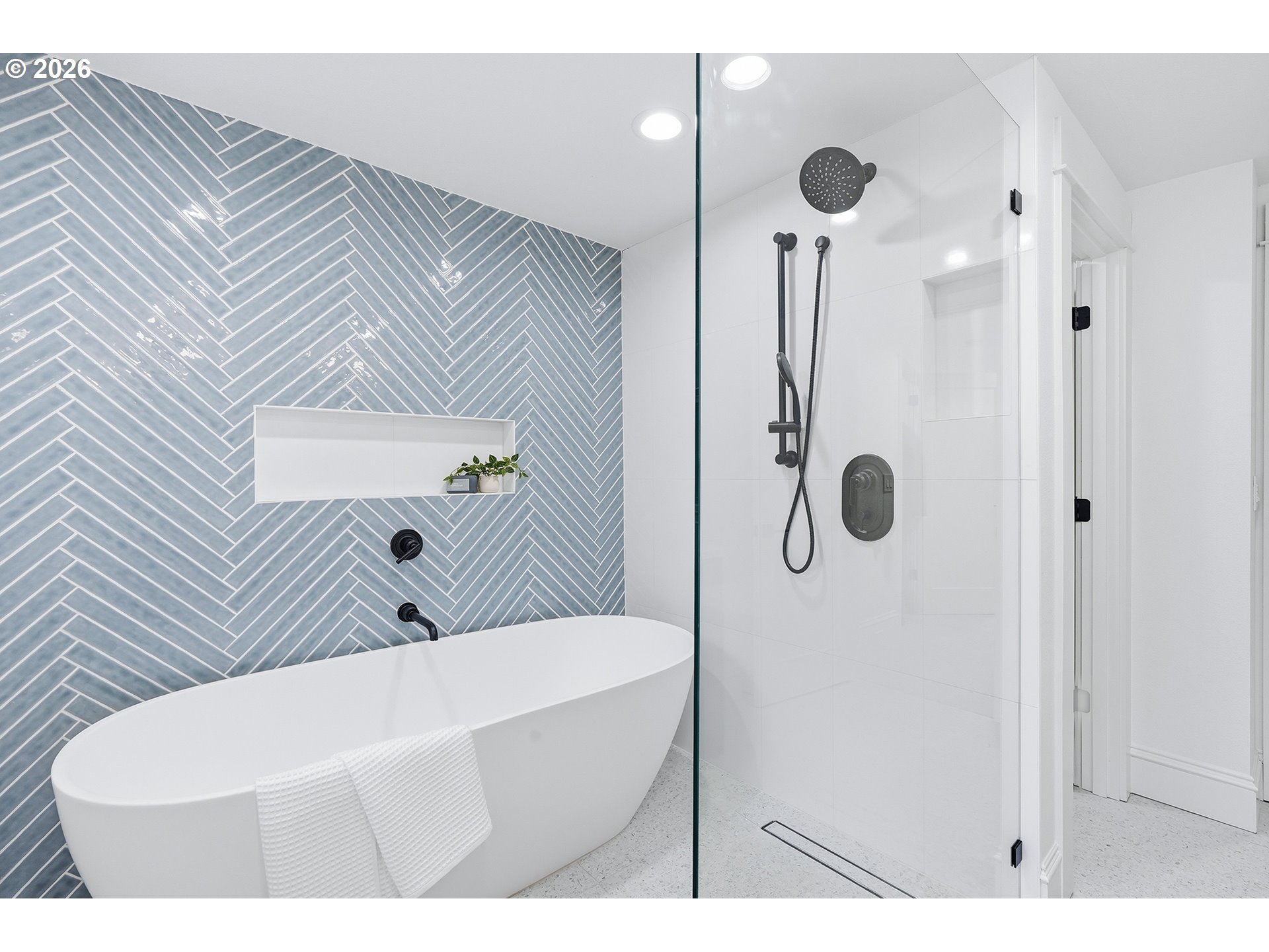 2125 Northwest 33rd Avenue Portland, OR 97210 - Photo 25 of 46 a bathroom with a sink a toilet and shower