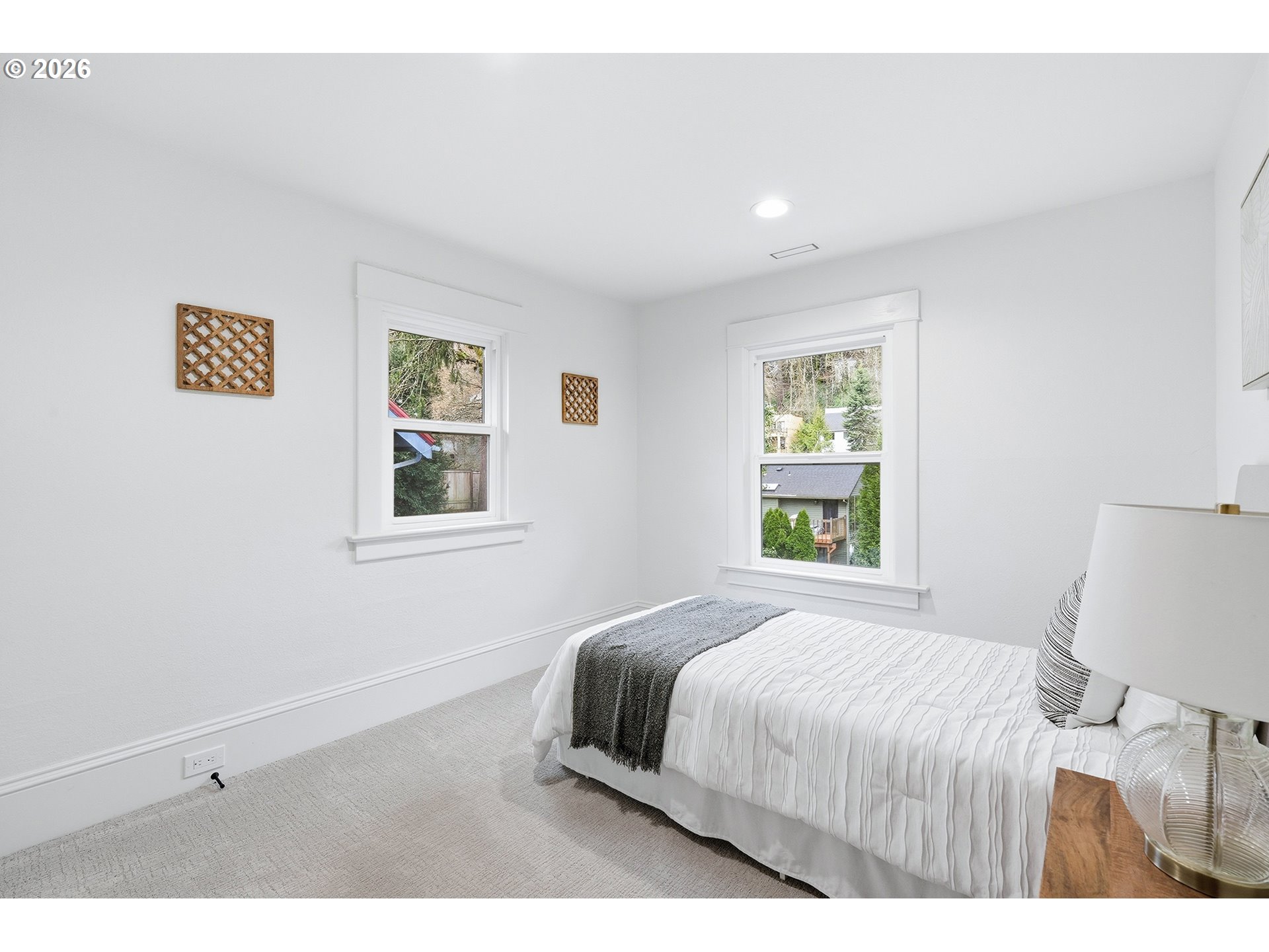 2125 Northwest 33rd Avenue Portland, OR 97210 - Photo 29 of 46 a bedroom with a bed and a window