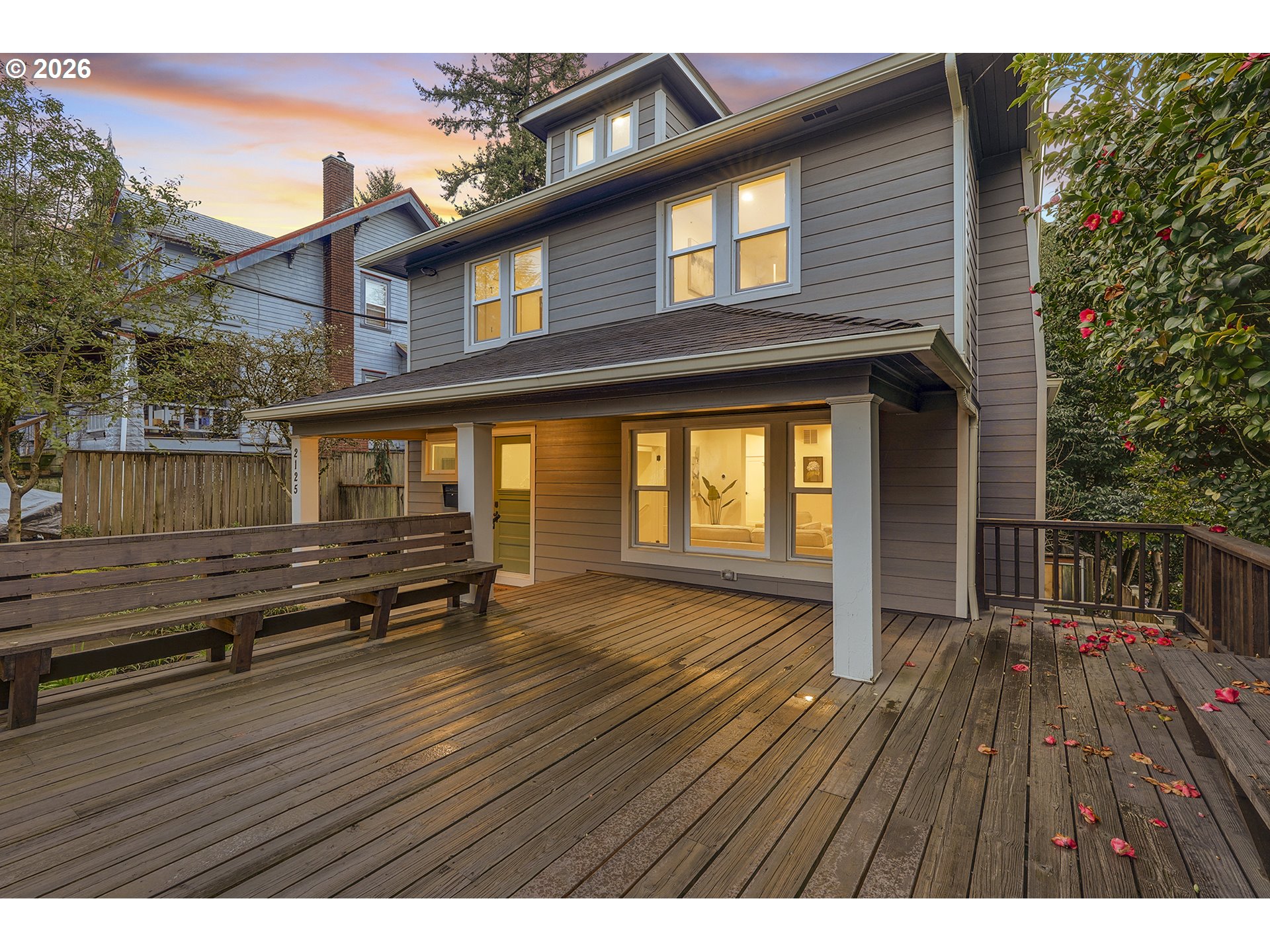 2125 Northwest 33rd Avenue Portland, OR 97210 - Photo 3 of 46 a view of wooden house with a large window