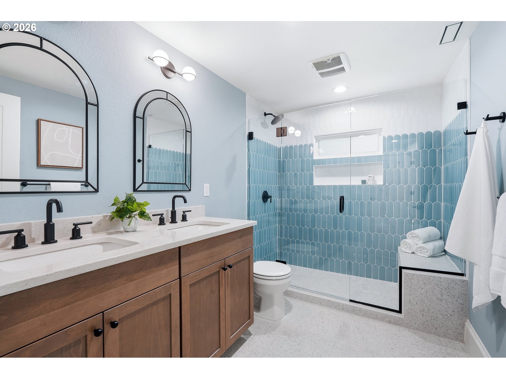 2125 Northwest 33rd Avenue Portland, OR 97210 - Photo 33 of 46 a bathroom with a double vanity sink toilet and shower