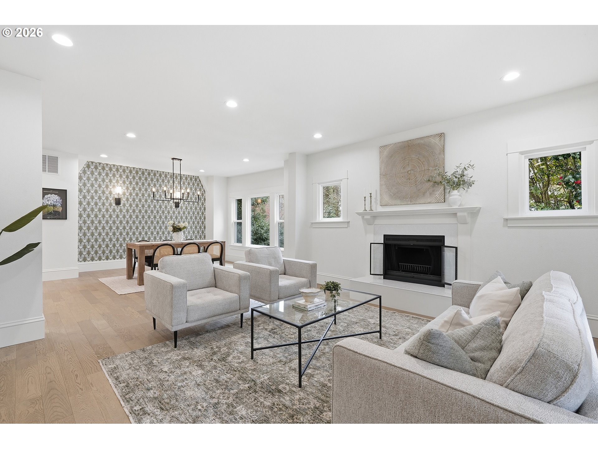 2125 Northwest 33rd Avenue Portland, OR 97210 - Photo 10 of 46 a living room with furniture a fireplace and a table