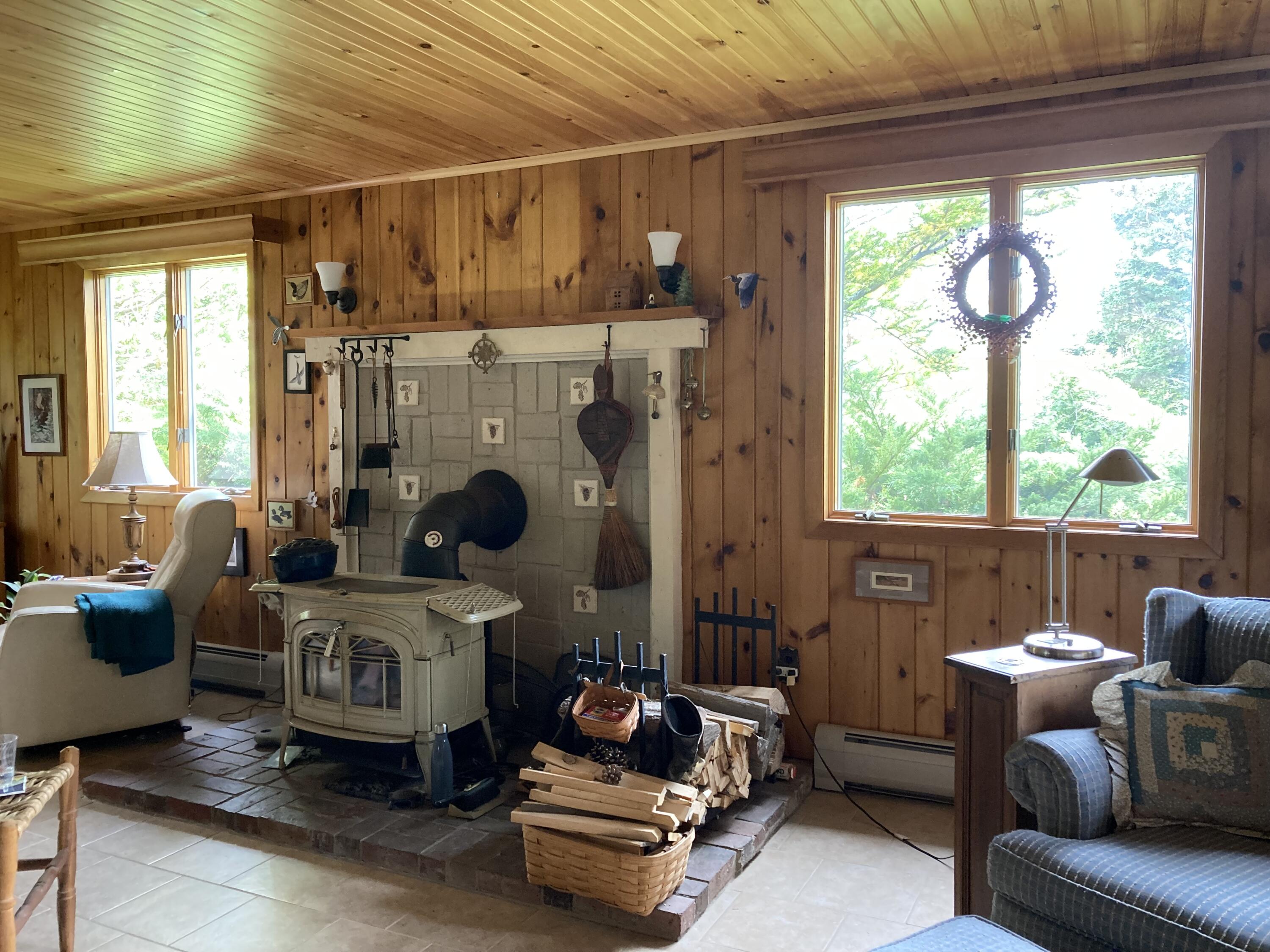 68 Crowley Island Road Corea, ME 04624 - Photo 23 of 24 Living room wood stove.