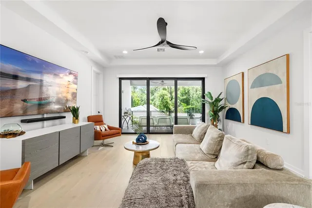 a view of a balcony with yard