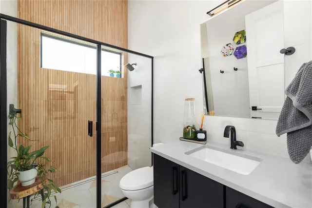 a bathroom with a bathtub and sink