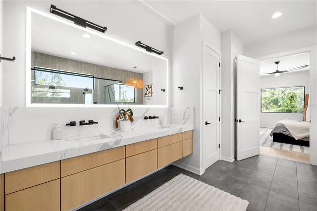 a bathroom with a bathtub and toilet