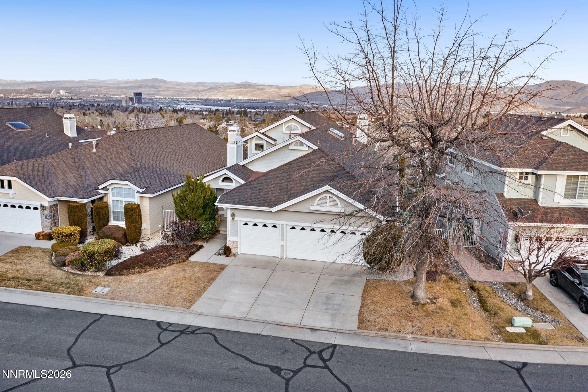 6186 Squires Lane Reno, NV 89519 - Photo 52 of 57 an aerial view of a house with swimming pool