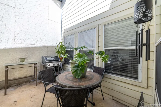 a table and chairs in the patio