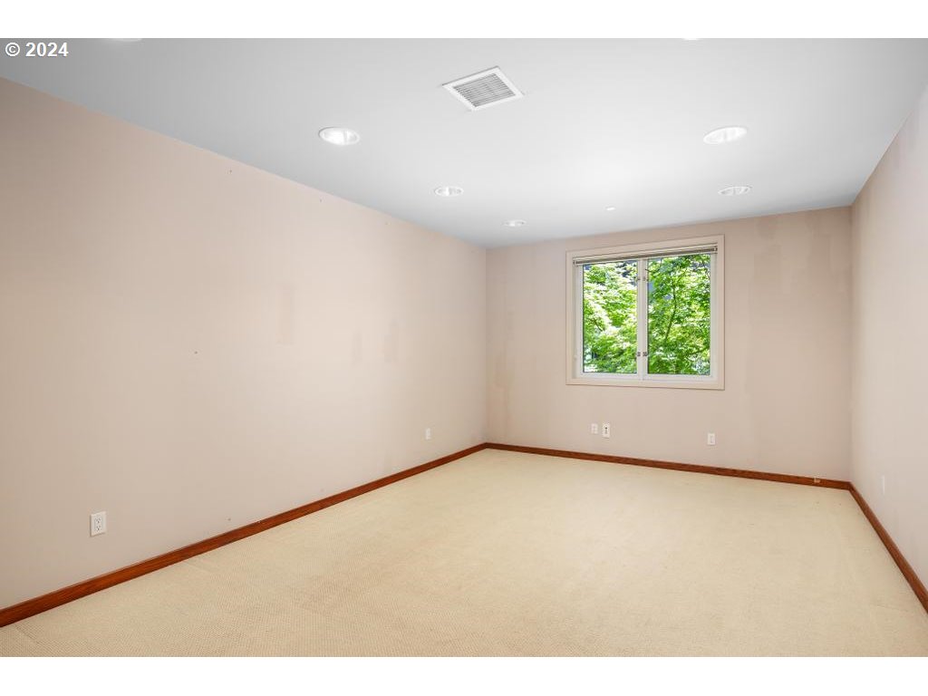 2020 Southwest Market St Drive, Unit 101 Portland, OR 97201 - Photo 28 of 33 an empty room with windows
