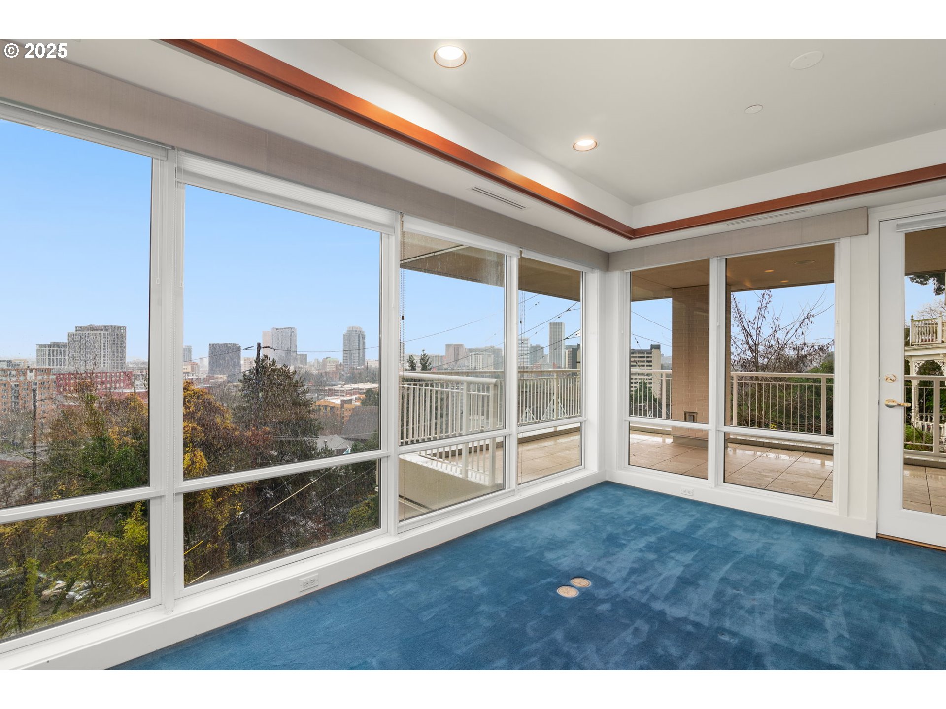 2020 Southwest Market St Drive, Unit 101 Portland, OR 97201 - Photo 3 of 33 a view of an empty room with wooden floor and a window
