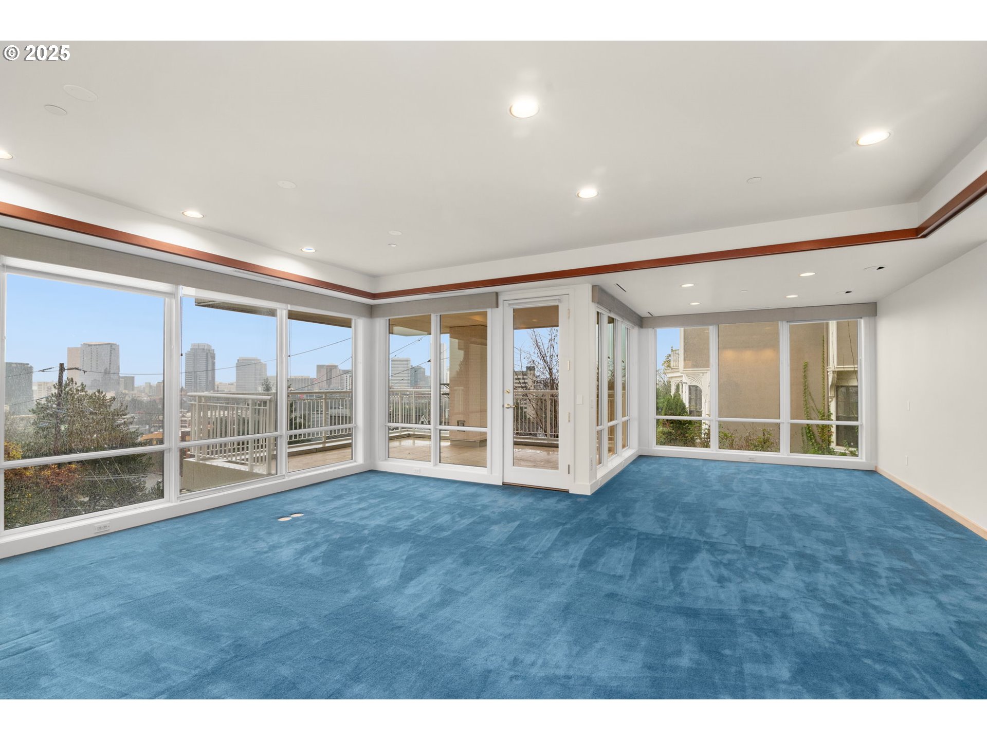2020 Southwest Market St Drive, Unit 101 Portland, OR 97201 - Photo 4 of 33 a view of an empty room with wooden floor and a window