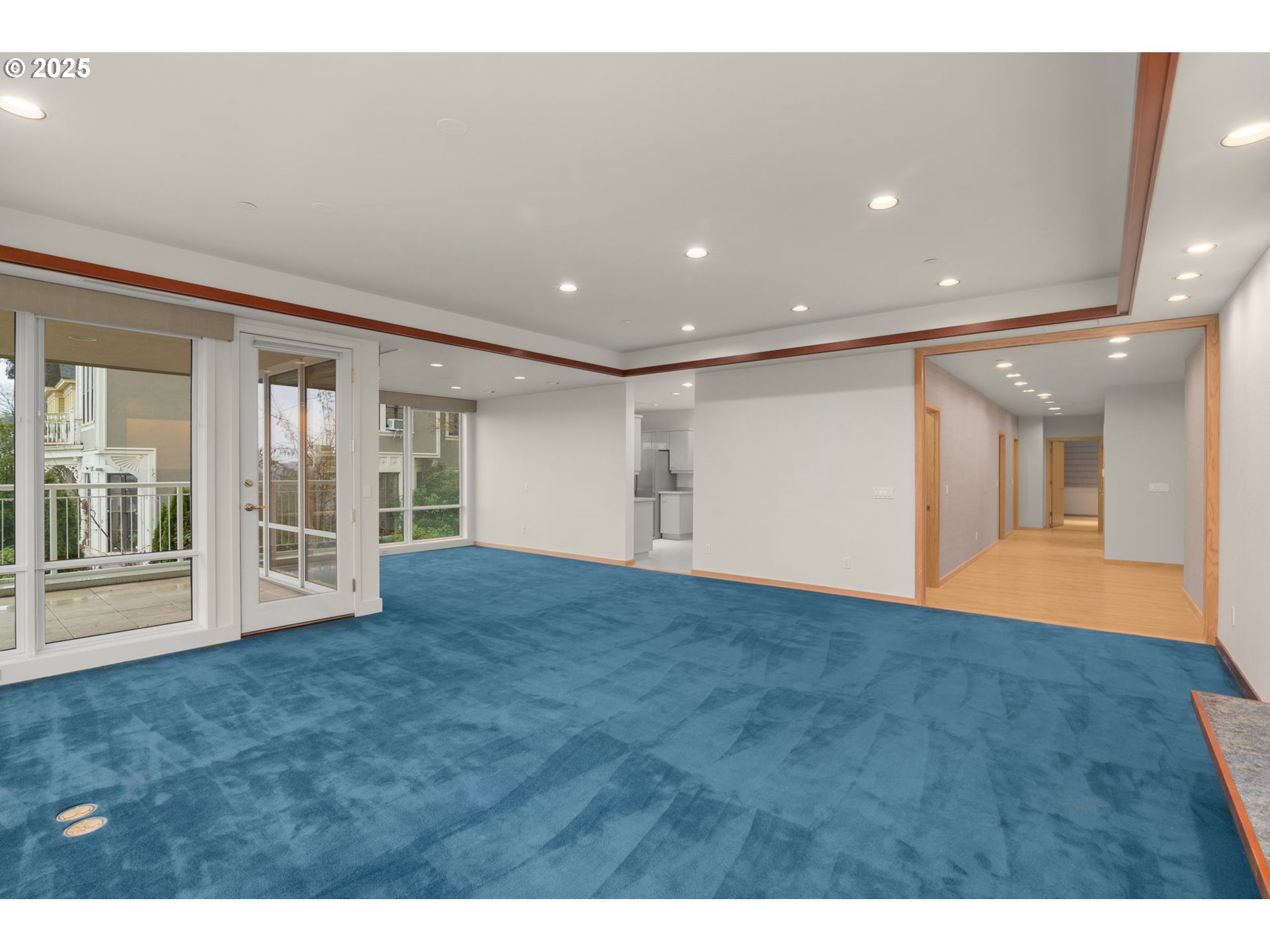 2020 Southwest Market St Drive, Unit 101 Portland, OR 97201 - Photo 8 of 33 a view of an empty room with glass door