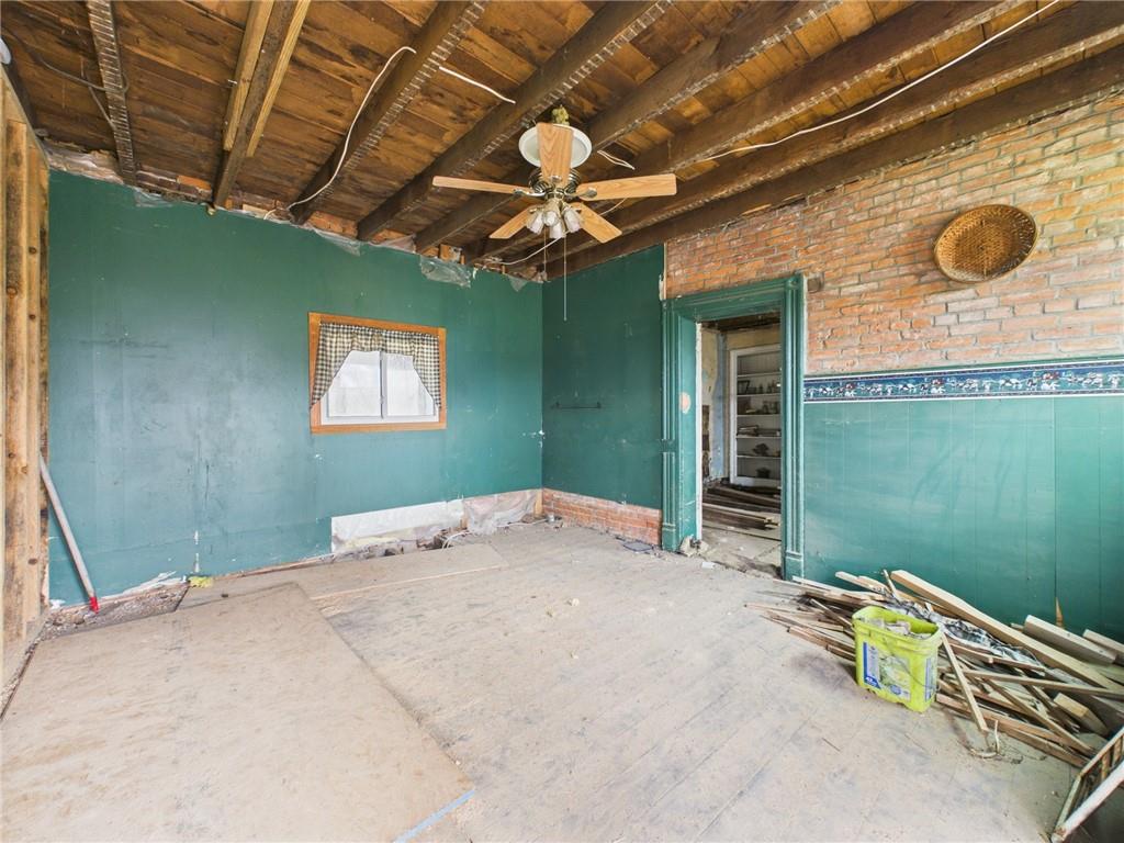 3698 Frew Mill Road New Castle, PA 16101 - Photo 12 of 25 a bedroom with bed and a window