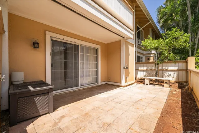 a backyard of a house with seating space